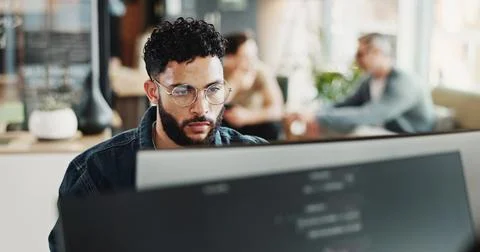 Coding, computer and web development with man in creative workplace for design Stock Photos