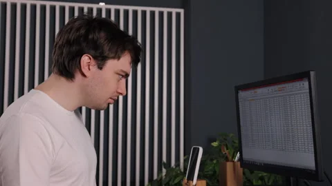 Coding computer, man document, desk view Stock Footage 308413113