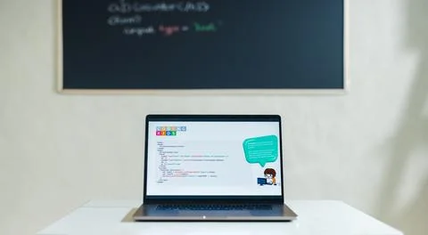Coding Education for Children: Laptop with a computer programme on the scre.. Stock Photos