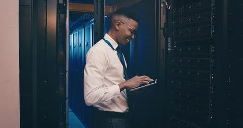 Coding, engineer and man with tablet, server room and happy for network 스톡 사진