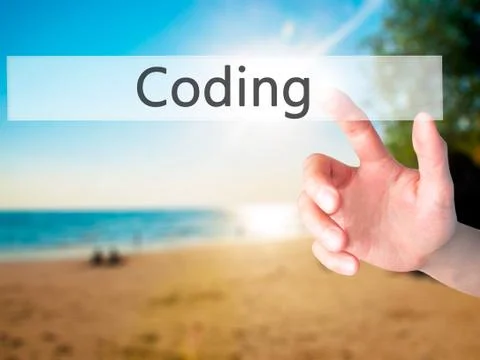Coding - Hand pressing a button on blurred background concept on visual scree 스톡 사진