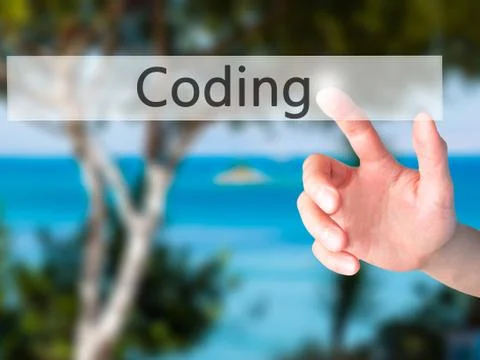 Coding - Hand pressing a button on blurred background concept on visual scree Stockfoto's