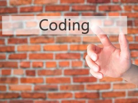 Coding - Hand pressing a button on blurred background concept on visual scree Stockfoto's