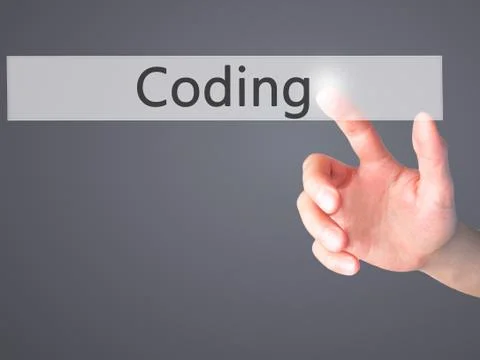 Coding - Hand pressing a button on blurred background concept on visual scree Stockfoto's