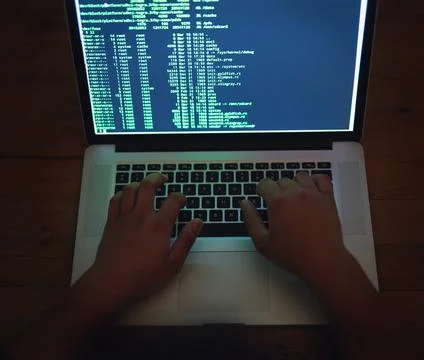 Coding, hands and hacker on laptop at night as malware thief for hacking Stock Photos