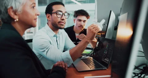 Coding, laptop and people in group discussion in office for help, web Stock Footage 309075070