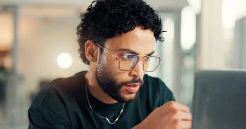 Coding, laptop and thinking with man in office at night for problem solving or Stock Photos