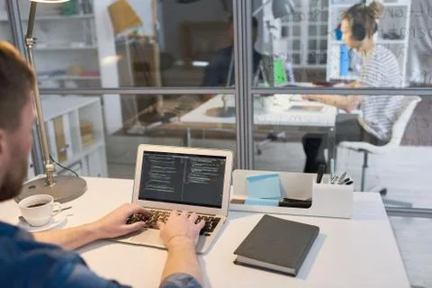 Coding on laptop Stock Photos