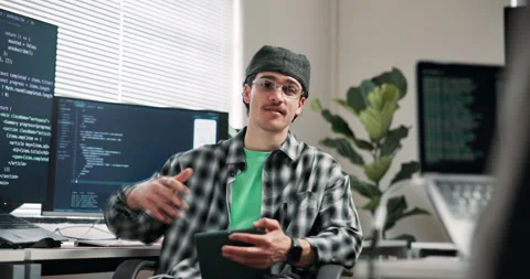 Coding, man or tablet in office for advice, technical guidance or system Stock Footage 346759473