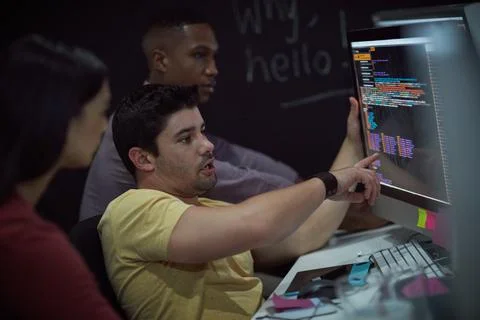 Coding, man or team with computer screen in office for software update, deb.. 写真素材