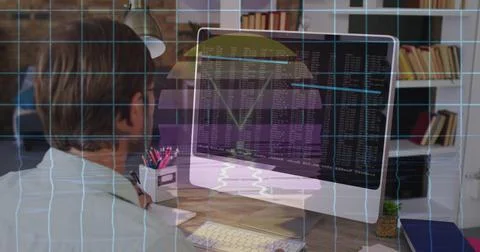 Coding mid-adult man typing at home office desk, with computer monitor keyboard Stock Photos