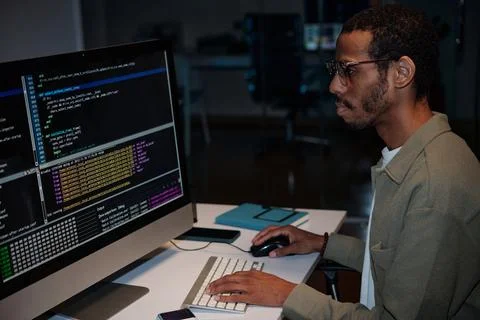 Coding Professional Analyzing Computer Screen Foto stock