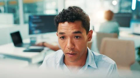 Coding, reading and man on computer in office for problem solving, web Stock Photos