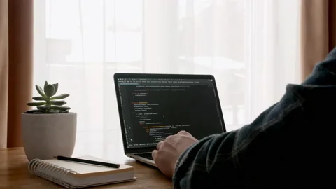 Coding on the screen, HTML encoding and programming on a laptop screen Vidéo 170740406