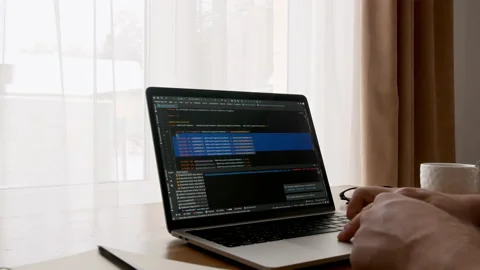 Coding on the screen, HTML encoding and programming on a laptop screen Vidéo 175649067