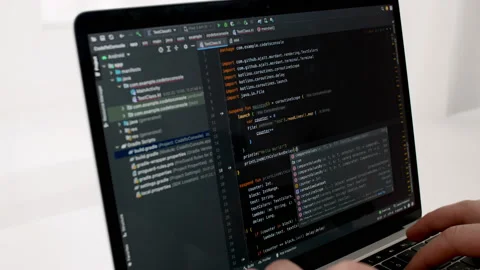 Coding on the screen, HTML encoding and programming on a laptop screen Vidéo 197979401