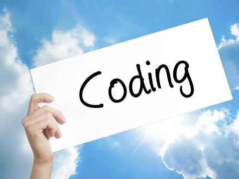 Coding Sign on white paper. Man Hand Holding Paper with text. Isolated on ... Stock-Fotos