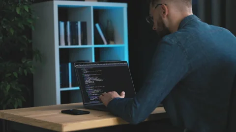 Coding software app on laptop Stock Footage 214355269