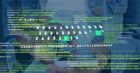 Coding software developer wearing denim shirt using floating code snippets and 스톡 사진