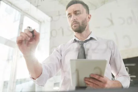 Coding specialist concentrated on work 스톡 사진