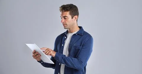 Coding, system and tablet with man in studio for programming or software Stock-Fotos