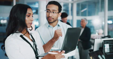 Coding team, laptop and people brainstorming in office for help, web development Stock Footage 309143121