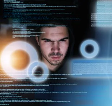 Coding till the sun comes up. a focussed young computer programmer working on Foto stock