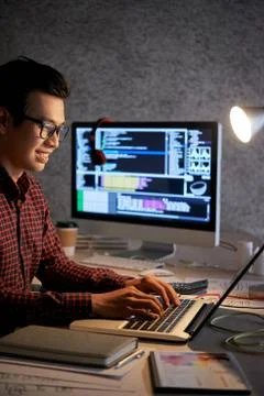 Coding young man Stock Photos