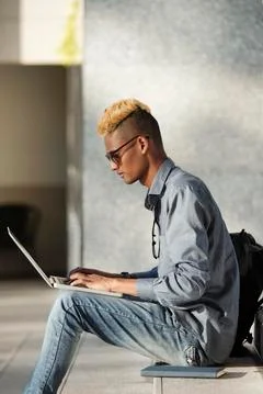 Coding young man Stock Photos