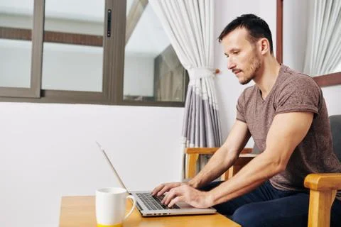 Coding young man working from home Stock Photos