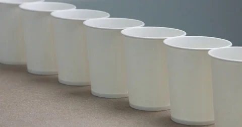 Cofe pours in one of paper cups in raw Stock Footage 75848742
