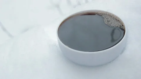 Cofe in white snow Stock Footage 35320125