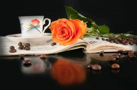 Coffe and rose Stock Photos