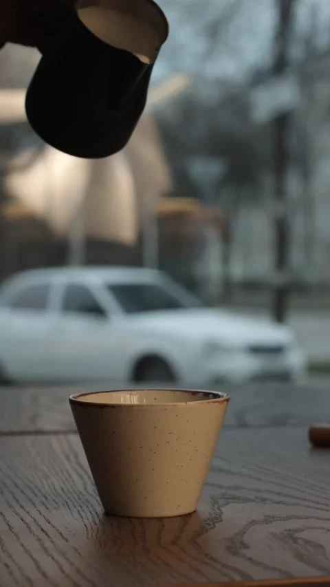 Coffe barista working to make a coffe. Hand drip coffeeTourists with drip coffee Stock Footage 161617340