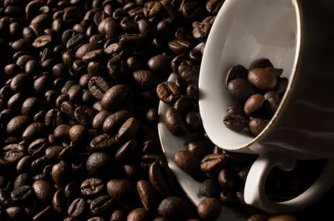 Coffe beans and cup. Stock Photos