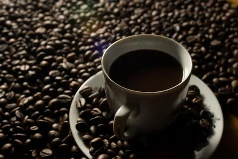 Coffe beans and cup. Foto stock
