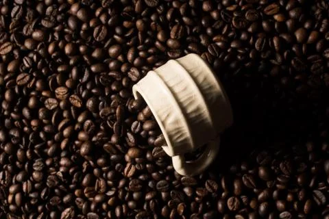 Coffe beans and cup. Stock Photos