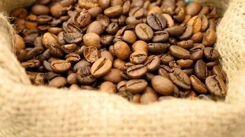 Coffe beans in sackcloth close up Stock Footage 80283665