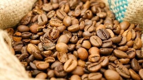 Coffe beans in sackcloth close up Stock Footage 80283723