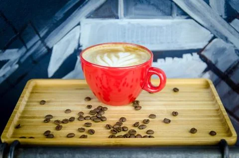 Coffe Cup with Beans on Plate Foto stock