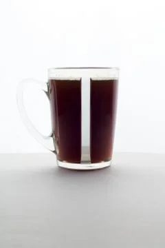 Coffe cup on white table Photos
