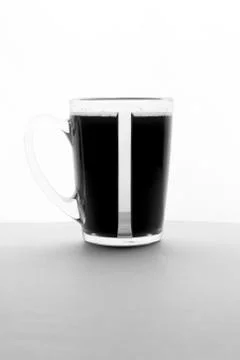Coffe cup on white table Stock Photos