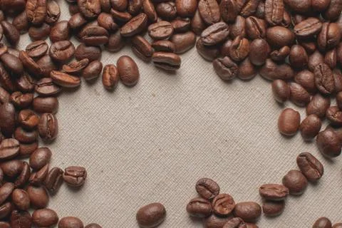 Coffe grains pile on the table Stock Photos