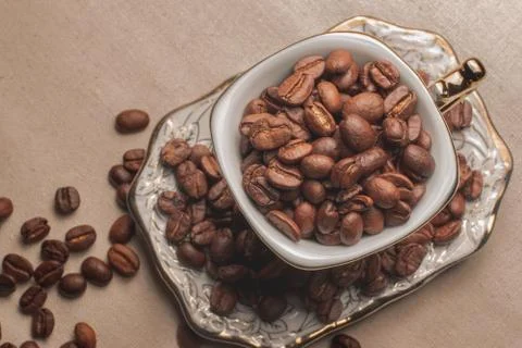Coffe grains pile on the table Stock Photos