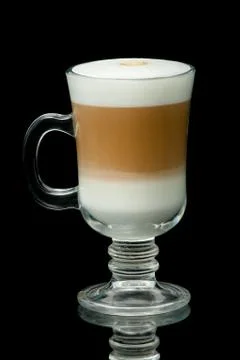 Coffe latte cup on the black background Stock Photos