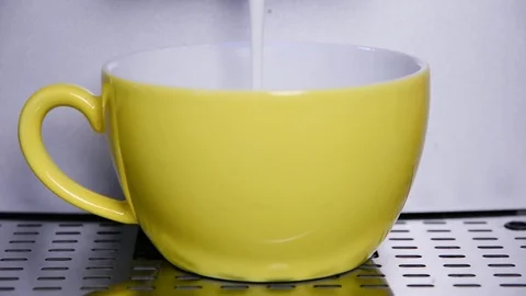 Coffe machine making automatically a cappuccino with milk froth Stock Footage 72243508