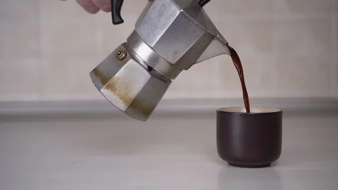 Coffe maker, pouring coffe into a cup Stock Footage 123894653