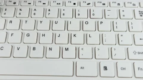 Coffe spilled on a computer keyboard close-up Stock Footage 151589749