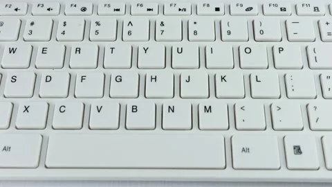 Coffe spilled on a computer keyboard close-up Stock Footage 151589750