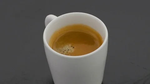 Coffe on Turntable - Black Background Stock Footage 75751656
